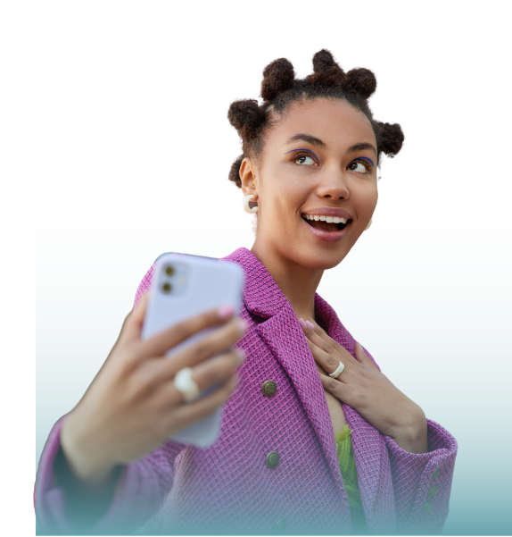 A creator holding a phone and carrying a brand message to an online audience