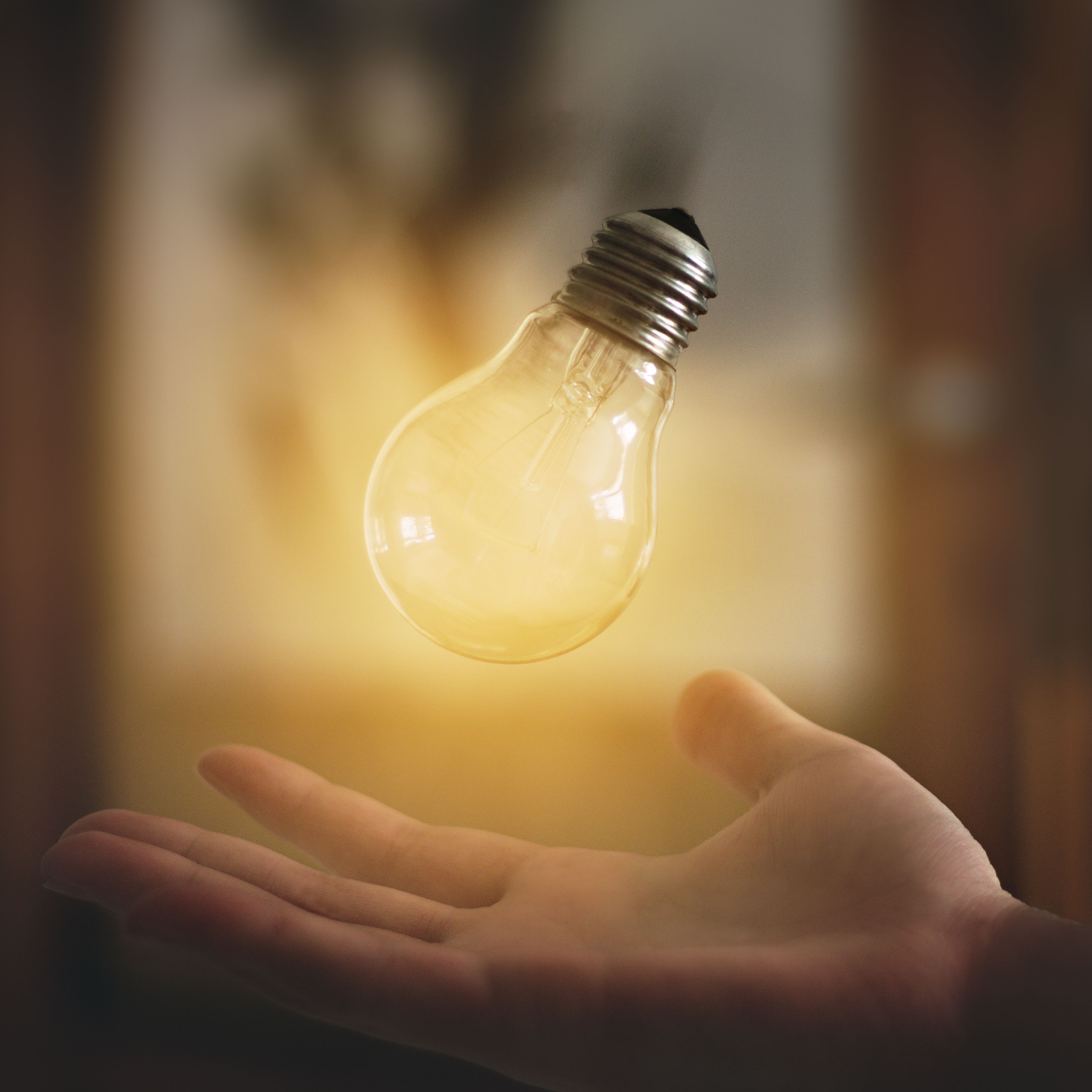 A glowing light bulb representing the core meaning of a story